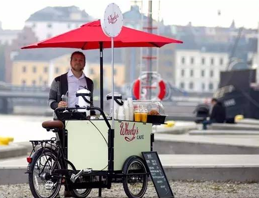 騎著自行車2年開出500家店，它能否開創(chuàng)咖啡新模式？|餐飲界